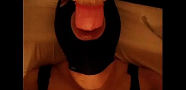  MaskMasked Asian sissy-boy transvestite sucking on dildo cock while jacking off